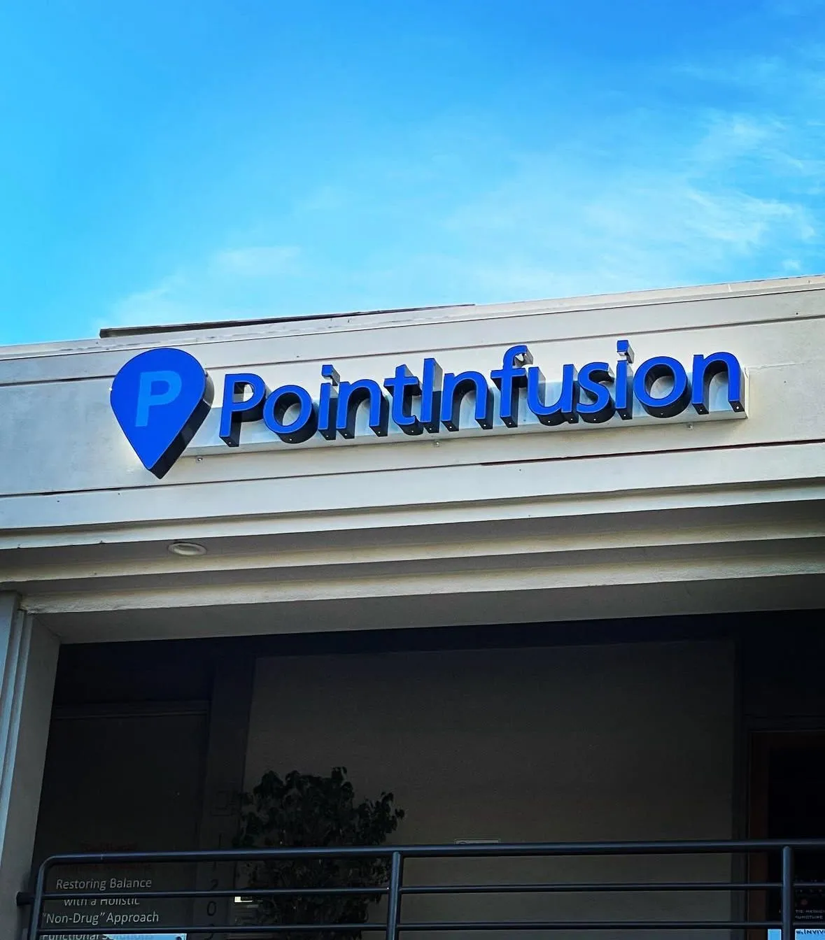 Sign fabrication detail with brushed metal finish