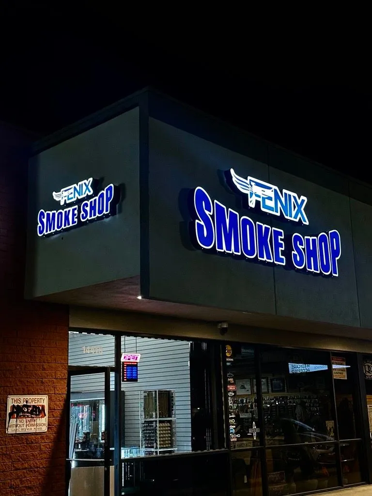 Custom illuminated storefront signage project by Fuze Signs