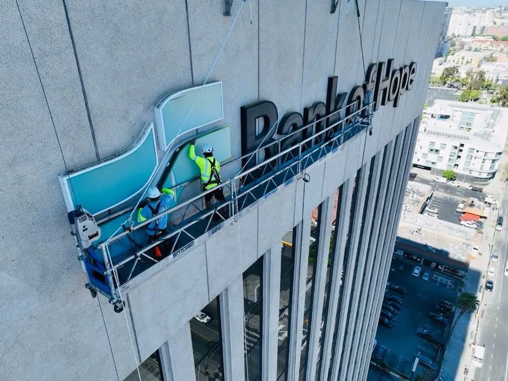 Dimensional business sign installed by Fuze Signs