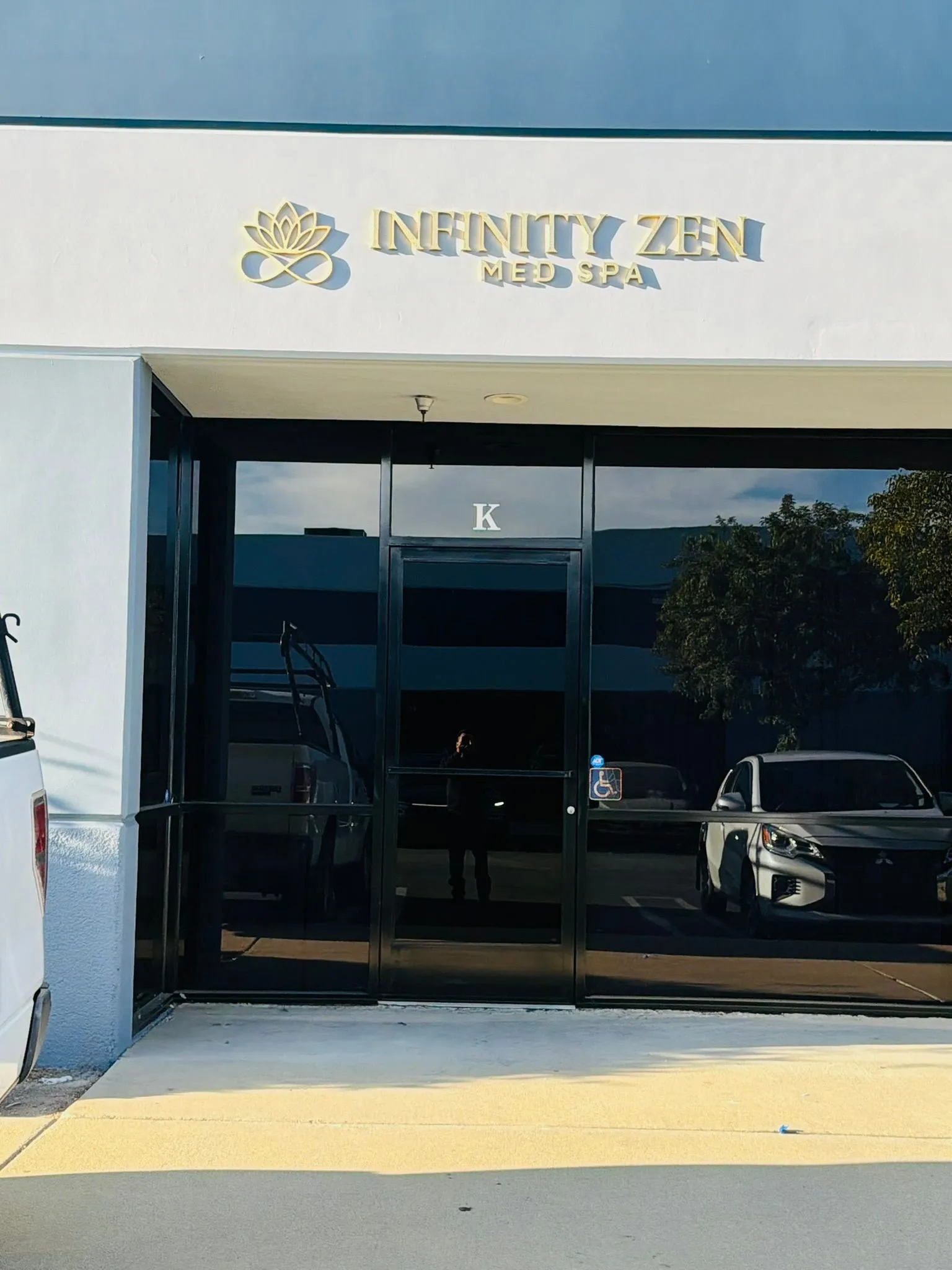 Professional sign installation on a brick facade